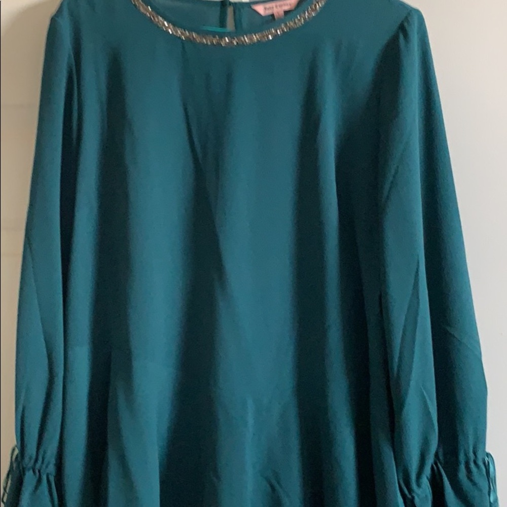 Ladies L Juicy couture asymmetrical hem blouse with bell sleeves.
